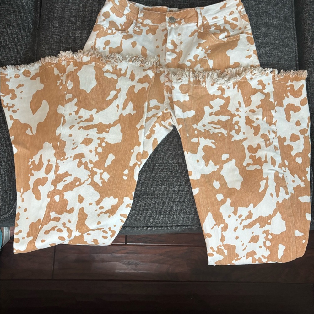 Cavender’s Saint & Hearts Frayed Hem Wide Leg Jeans in Mango and White cow print